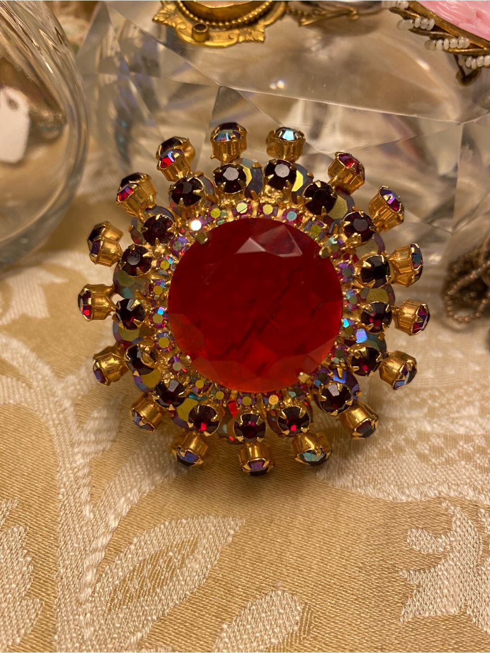 Vintage-Red Crystal Sunburst Brooch - Gold Tone